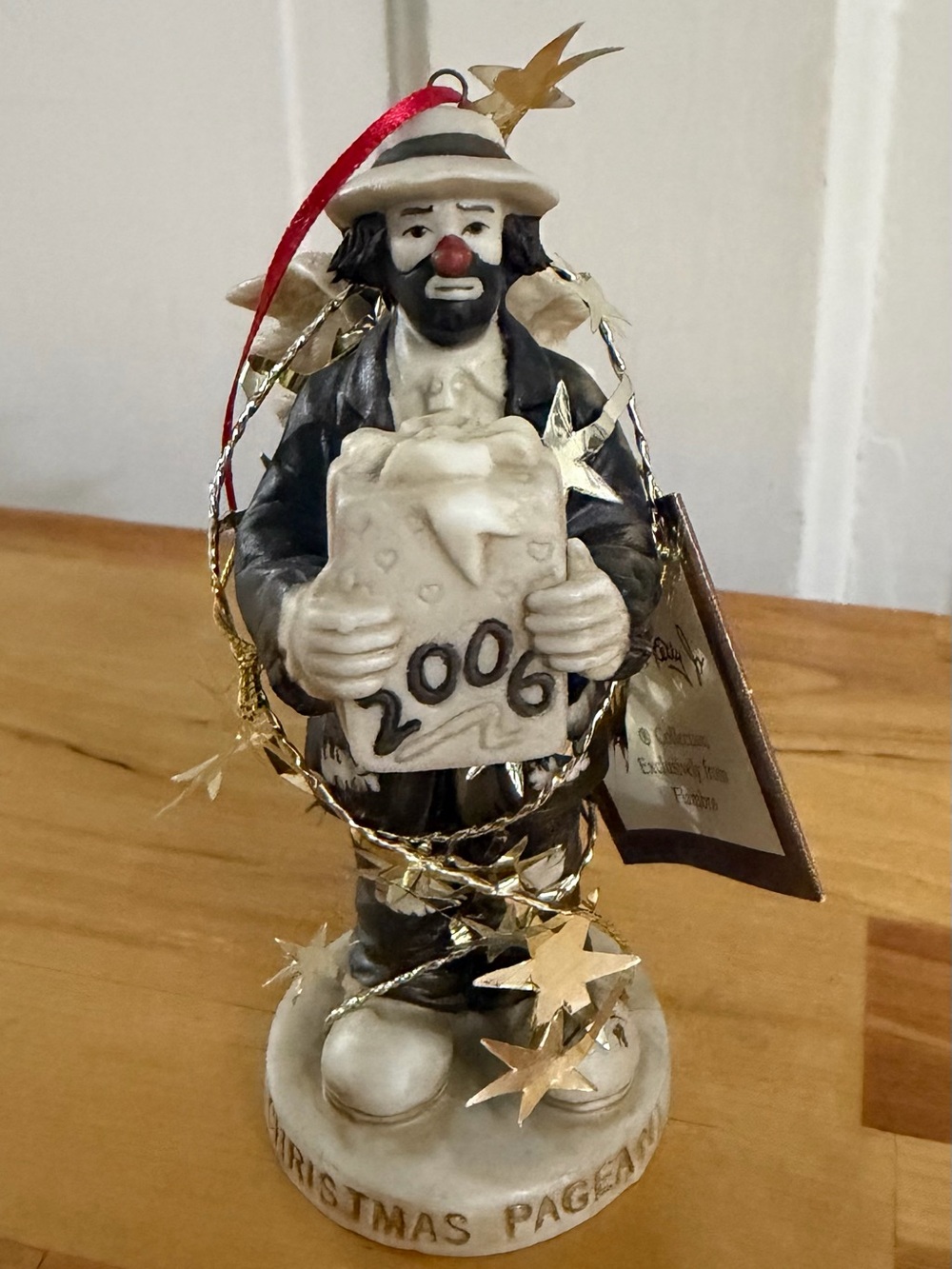 Black and Cream Clown Holiday Ornament with Gold Star Garland
